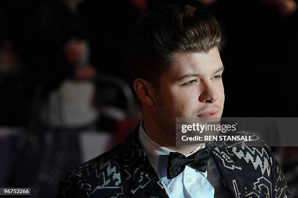 Australian singer Daniel Merriweather arrives on the red carpet for The Brit Awards 2010 at Earls Court in London on February 16, 2010. Lady Gaga,...