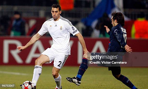 Alvaro Arbeloa of Real Madrid gives a pass during the Champions League round of 16 first leg match between Lyon and Real Madrid, at Stade de Gerland...