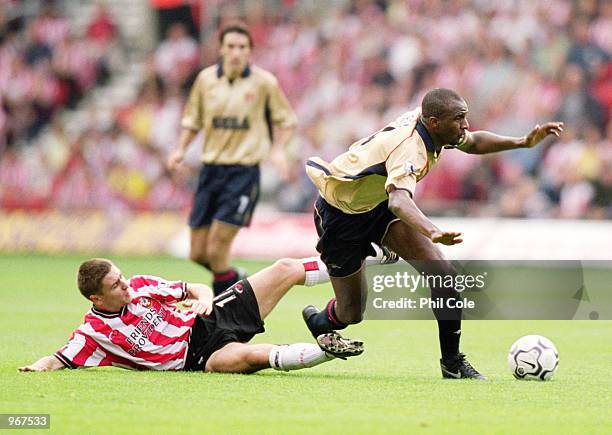 Patrick Vieira of Arsenal is brought down by Marian Pahars of Southampton during the FA Barclaycard Premiership match played at St Mary's, in...