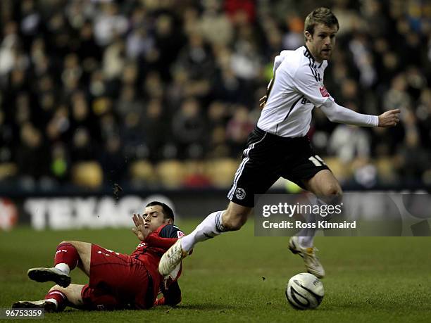 Michael Tonge of Derby is challenged by Ross Wallace of Preston during the Coca Cola Championship match between Derby County and Preston North End at...