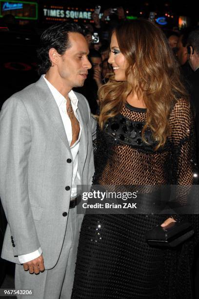 Marc Anthony and Jennifer Lopez arrive at a party to celebrate the release of her new album "Como Ama Una Mujer" held at Spotlight Live, New York...