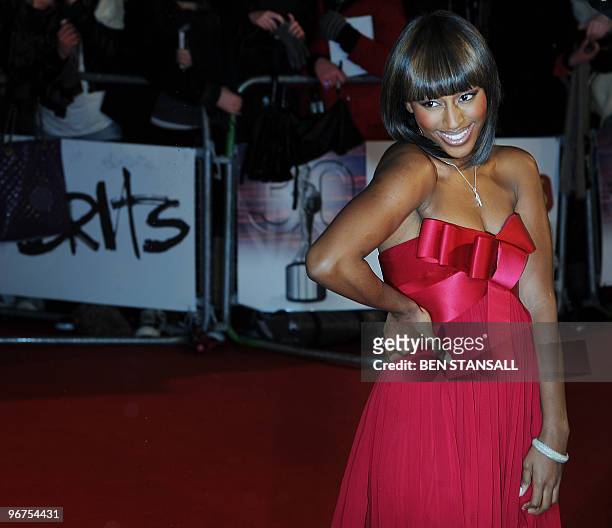 British singer Alexandra Burke walks on the red carpet upon her arrival for The Brit Awards 2010 at Earls Court in London on February 16, 2010. Lady...