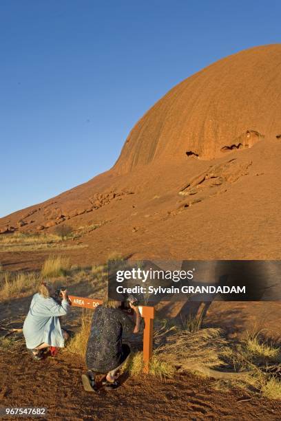 Uluru, also known as Ayers Rock, is a large sandstone rock formation in the southern part of the Northern Territory, central Australia. It lies 335...