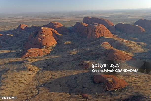 Uluru, also known as Ayers Rock, is a large sandstone rock formation in the southern part of the Northern Territory, central Australia. It lies 335...