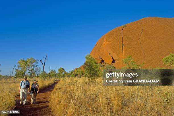 Uluru, also known as Ayers Rock, is a large sandstone rock formation in the southern part of the Northern Territory, central Australia. It lies 335...