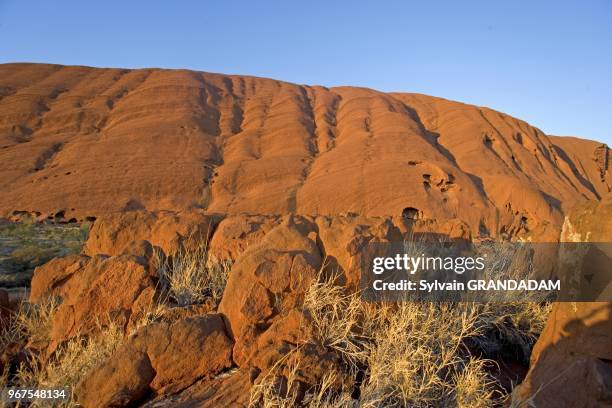 Uluru, also known as Ayers Rock, is a large sandstone rock formation in the southern part of the Northern Territory, central Australia. It lies 335...