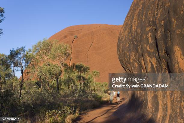 Uluru, also known as Ayers Rock, is a large sandstone rock formation in the southern part of the Northern Territory, central Australia. It lies 335...