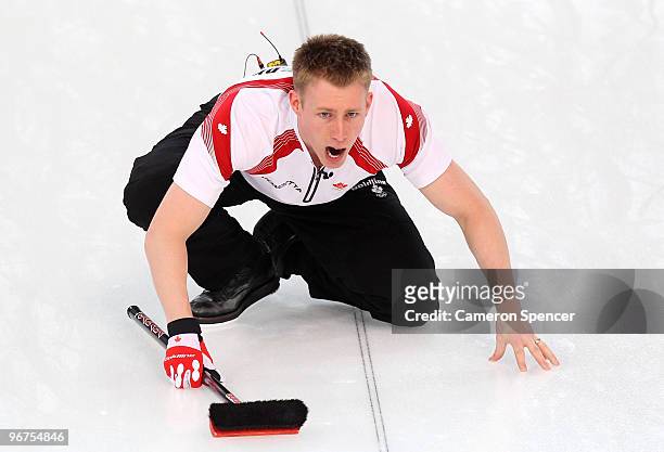 Marc Kennedy of Canada instructs his teammates during the men's curling round robin game between Canada and Norway on day 5 of the Vancouver 2010...