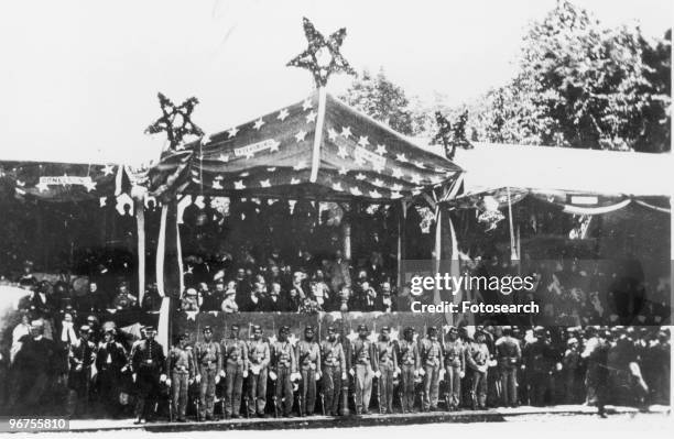 The Grand Review, Washington DC, with reviewing stand with General Ulysses S. Grant and President Andrew Johnson , and cabinet in a photographed by...