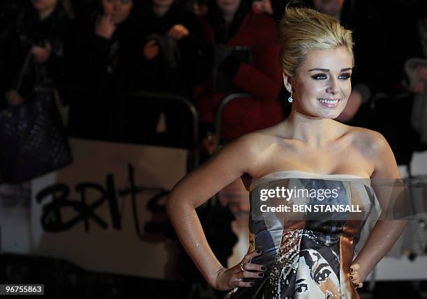 British opera singer Katherine Jenkins walks on the red carpet upon her arrival for The Brit Awards 2010 at Earls Court in London on February 16,...