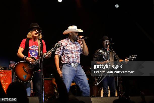 Big Kenny and Cowboy Troy, and John perform at the 8th Annual Music City Gives Back concert at Ascend Park on June 4, 2018 in Nashville, Tennessee.