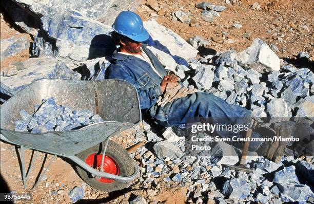 Worker rests after lunch in the Flores de Los Andes Lapis Lazuli mine, located at 3,700 meter high in the Andes, on April 1 near Ovalle, Northern...