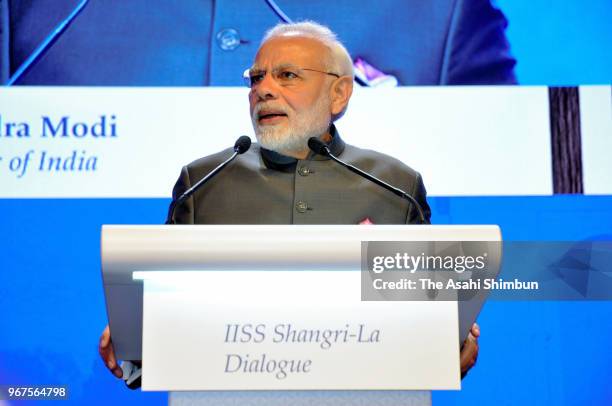 Indian Prime Minister Narendra Modi addresses the opening remarks during the Asia Security Summit, aka Shangri-La Dialogue on June 1, 2018 in...