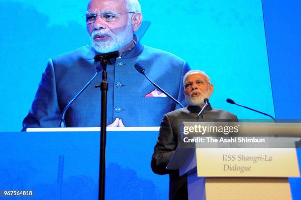 Indian Prime Minister Narendra Modi addresses the opening remarks during the Asia Security Summit, aka Shangri-La Dialogue on June 1, 2018 in...