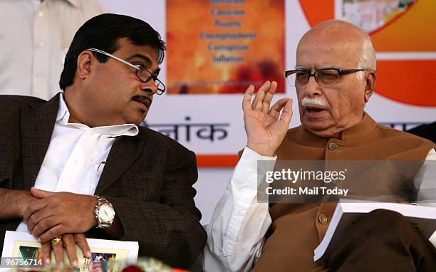 Senior BJP leader L K Advani and President Nitin Gadkari during the 42nd death anniversary of party leader Deendayal Upadhyaya in New Delhi on...