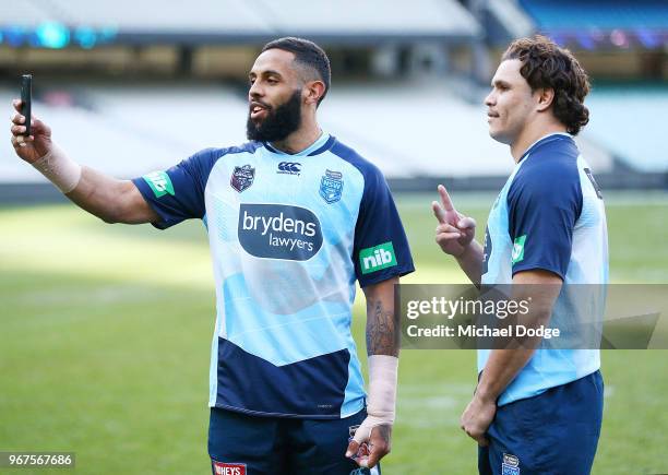 Josh Addo-Carr of the Blues poses for a selfie with James Roberts during a New South Wales Blues State of Origin Captain's Run at the Melbourne...