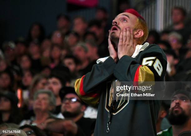 Vegas Golden Knights fan Jay Bryant-Chavez of Nevada reacts after Tom Wilson of the Washington Capitals scored a first-period goal against the Vegas...