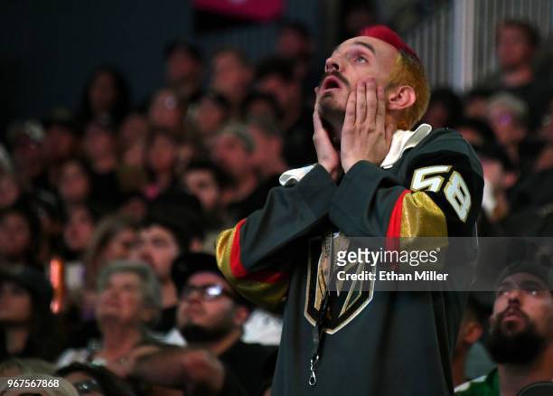 Vegas Golden Knights fan Jay Bryant-Chavez of Nevada reacts after Tom Wilson of the Washington Capitals scored a first-period goal against the Vegas...