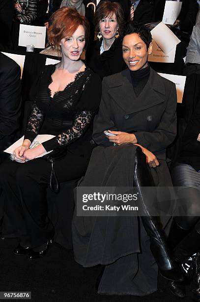 Actress Christina Hendricks and Nicole Murphy attend Mercedes-Benz Fashion Week at Bryant Park on February 16, 2010 in New York City.