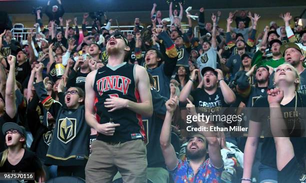 Vegas Golden Knights fans react during a Golden Knights road game watch party for Game Four of the 2018 NHL Stanley Cup Final between the Golden...