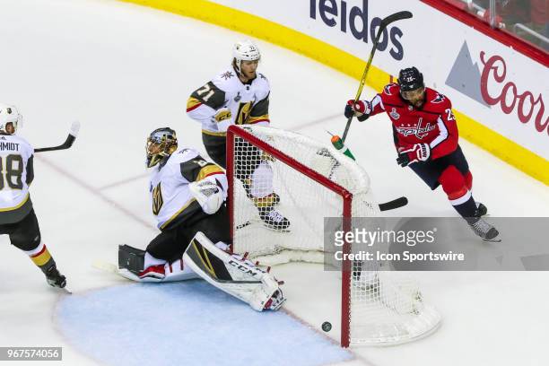 Washington Capitals right wing Devante Smith-Pelly celebrates goal past Vegas Golden Knights goaltender Marc-Andre Fleury as other Golden Knight...