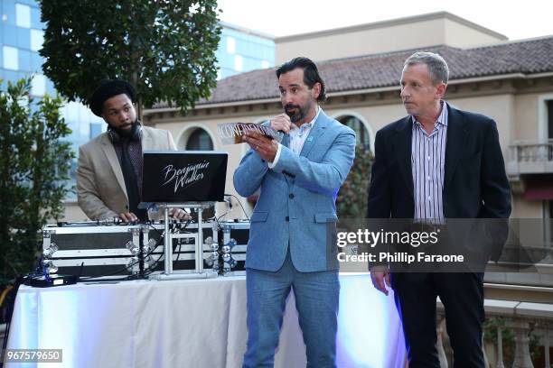 Chris Gialanella and Spencer Beck speak onstage at the Los Angeles Confidential Celebration for Portraits of Pride with GLAAD and Laverne Cox on June...