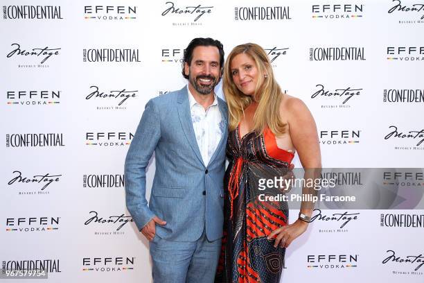 Chris Gialanella and Andrea Gialanella attend the Los Angeles Confidential Celebration for Portraits of Pride with GLAAD and Laverne Cox on June 4,...
