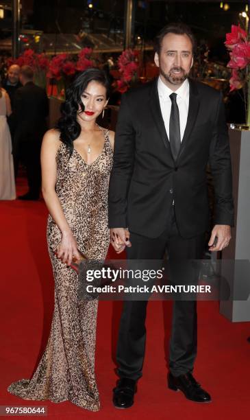 Nicolas Cage and Alice Kim attend the premiere for the movie 'The Croods' during the 63rd Berlinale International Film Festival on February 15, 2013...