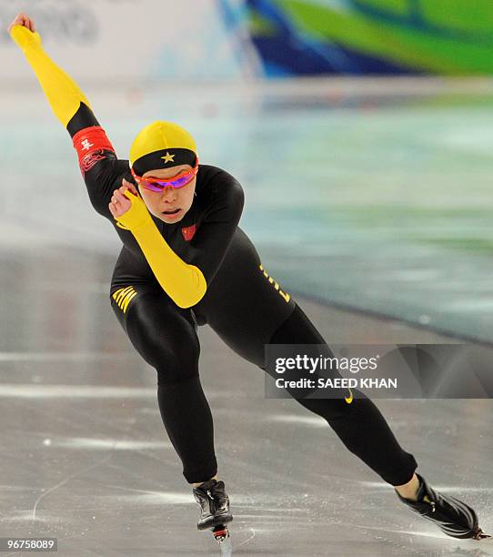 China's Aihua Xing competes in her speedskating Ladies 500m race at the Richmond Olympic oval in Richmond outside Vancouver during the 2010 Winter...