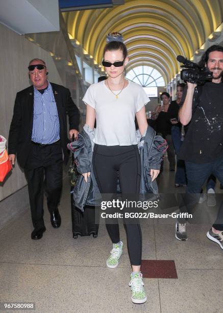 Behati Prinsloo is seen at 'Los Angeles International Airport' on June 04, 2018 in Los Angeles, California.