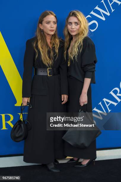 Mary-Kate Olsen and Ashley Olsen attend the 2018 CFDA Fashion Awards at Brooklyn Museum on June 4, 2018 in New York City.