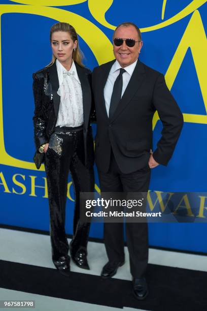 Amber Heard and Michael Kors attend the 2018 CFDA Fashion Awards at Brooklyn Museum on June 4, 2018 in New York City.