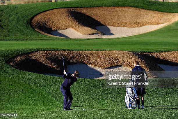 Luke Donald of England plays a shot during the second practice round prior to the start of the Accenture Match Play Championship at the Ritz-Carlton...
