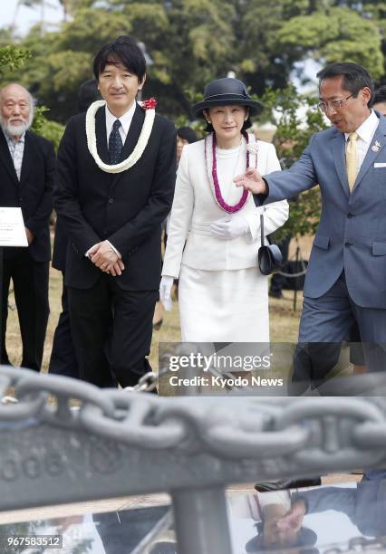 Japanese Prince Akishino and his wife Princess Kiko visit on June 4 a monument in Honolulu dedicated to nine people who died in a 2001 collision off...