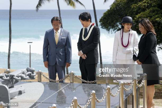 Japanese Prince Akishino and his wife Princess Kiko visit on June 4 a monument in Honolulu dedicated to nine people who died in a 2001 collision off...