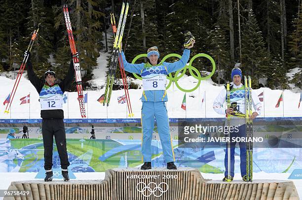 Gold medal winner Sweden's Bjorn Ferry , silver medal winner Austria's Christoph Sumann and bronze medal winner France's Vincent Jay attend the...