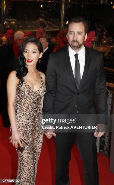 Nicolas Cage and Alice Kim attend the premiere for the movie 'The Croods' during the 63rd Berlinale International Film Festival on February 15, 2013...