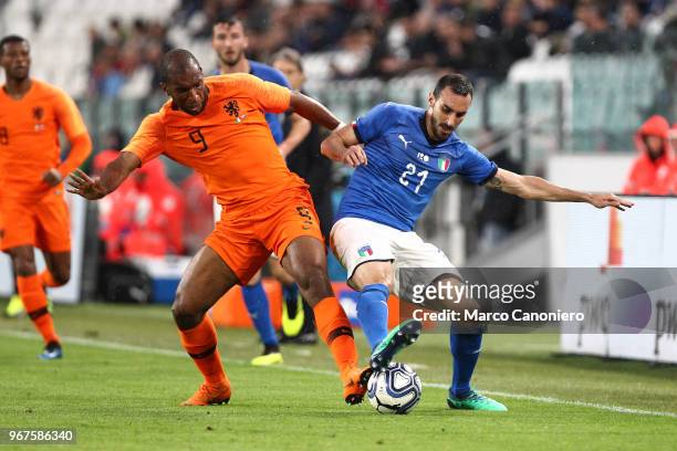 Ryan Babel of Netherlands and Davide Zappacosta of Italy in action during the International Friendly match between Italy and Netherlands. The match...