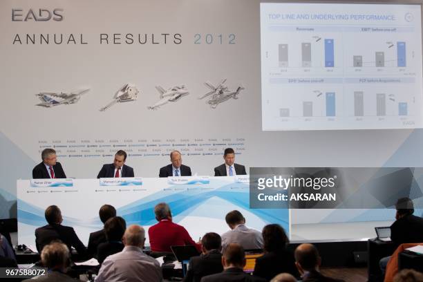 Harald Wilhem, EADS CFO, Tom Enders EADS CEO and Marwan Lahoud, EADS CSMOs attend the annual news conference in Berlin February 27, 2013. The...