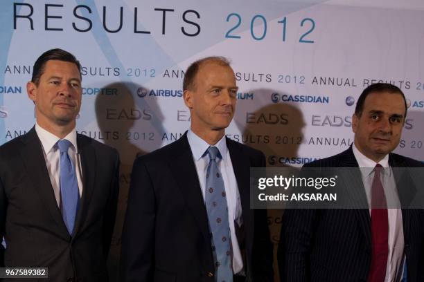 Harald Wilhem, EADS CFO, Tom Enders EADS CEO and Marwan Lahoud, EADS CSMOs attend the annual news conference in Berlin February 27, 2013. The...