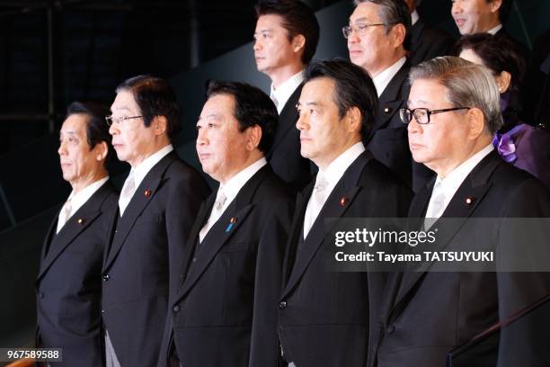 Japan's Prime Minister Yoshihiko Noda and his Cabinet members step down for an official photo session at the prime minister's official residence in...