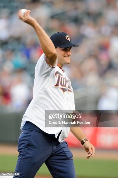 Kirk Cousins of the Minnesota Vikings delivers a ceremonial pitch before the game between the Minnesota Twins and the Cleveland Indians on June 1,...