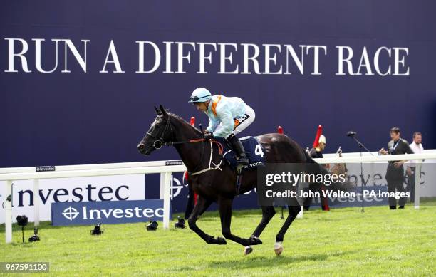 Marie's Diamond ridden by Jockey Silvestre de Sousa prior to Investec Woodcote EBF Stakes