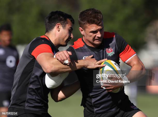 Henry Slade is tackled by Alex Lozowski during the England training session held at Kings Park Stadium on June 5, 2018 in Durban, South Africa.