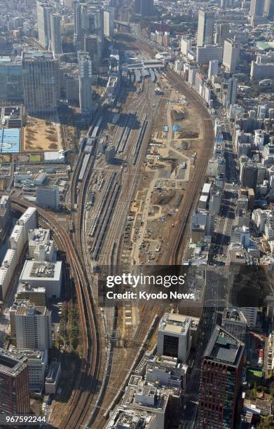 Photo taken on March 16 from a Kyodo News helicopter shows the construction site for a new station on the Yamanote loop line in Tokyo. ==Kyodo