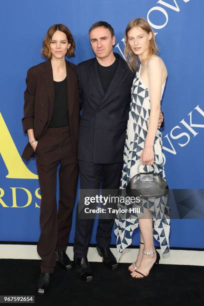 Freja Beha Erichsen, Raf Simons, and Julia Nobis attend the 2018 CFDA Awards at Brooklyn Museum on June 4, 2018 in New York City.