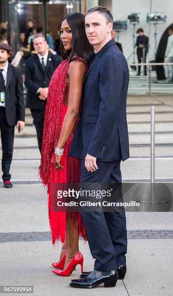 Model Naomi Campbell and fashion designer Raf Simons are seen arriving to the 2018 CFDA Fashion Awards at Brooklyn Museum on June 4, 2018 in New York...