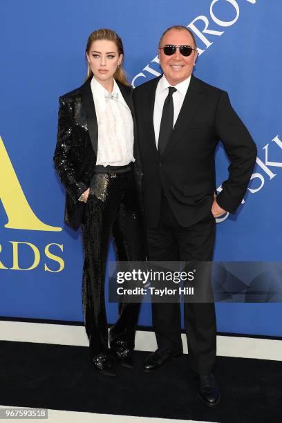 Amber Heard and Michael Kors attend the 2018 CFDA Awards at Brooklyn Museum on June 4, 2018 in New York City.