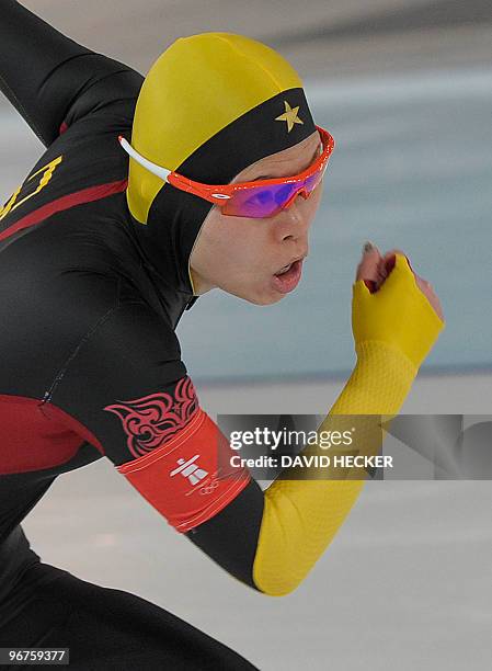 China's Aihua Xing competes in the Ladies' 500m Speedskating race at the Richmond Olympic Oval, in Richmond, during the XXI Winter Olympics on...