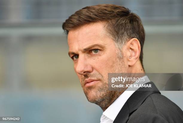 Serbia's headcoach Mladen Krstajic listens to his national anthem during the international friendly football match Serbia v Chile at the Merkur Arena...